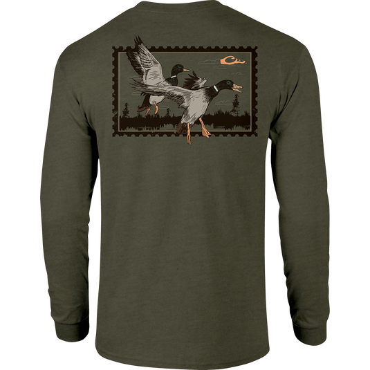 A long-sleeved green Sunset Flight T-Shirt with ducks in flight, featuring a Drake logo pocket. Constructed from 60% cotton and 40% polyester for comfort. Ideal for hunting and outdoor enthusiasts.