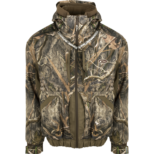 A versatile camouflage jacket with zip-in liner for increased flexibility and customization. Designed for hunters, it offers unparalleled protection with waterproof/windproof/breathable fabric and fowl-proof pockets. The LST Refuge™ 3.0 3-in-1 Jacket from Drake Waterfowl.