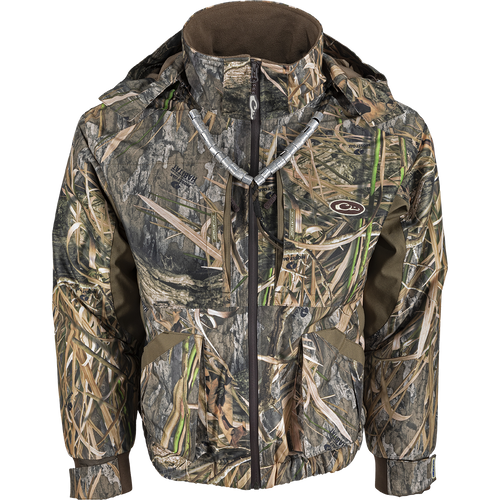 Refuge 3.0 Waterfowler's Wading Jacket: A waterproof camouflage jacket with taped seams, YKK zippers, and multiple pockets for hunting essentials.