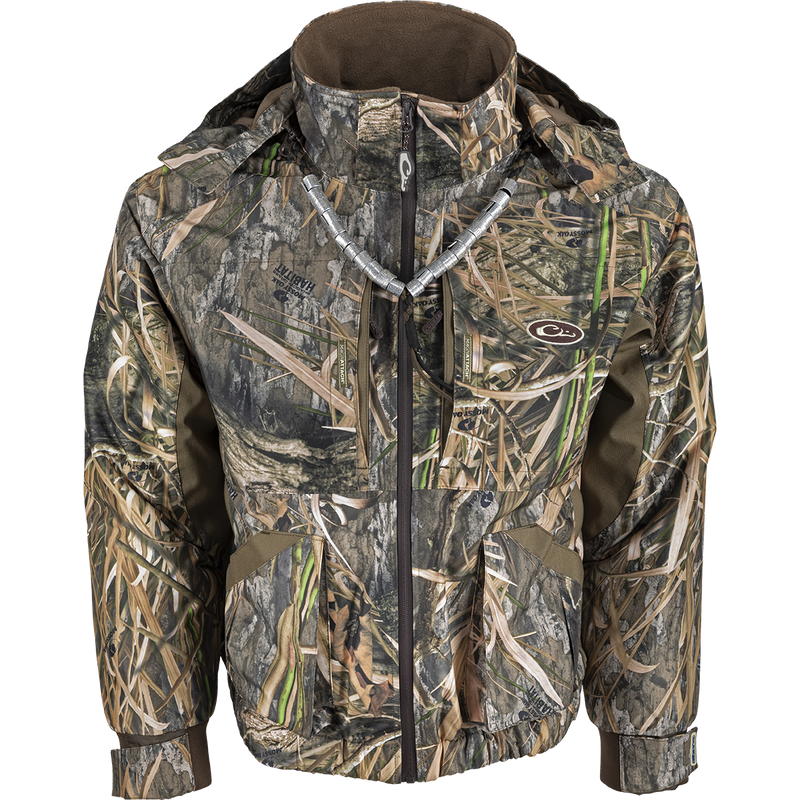 Refuge 3.0 Waterfowler's Wading Jacket: A waterproof camouflage jacket with taped seams, YKK zippers, and multiple pockets for hunting essentials.