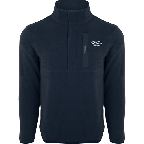 Camp Fleece Pullover 2.0: A black jacket with a white logo, perfect for layering. Lightweight, breathable, and moisture-wicking, ideal for Spring or Fall outfits. Neck snap closure, anti-pill treatment, and Magnattach™ chest pocket. High-quality hunting gear from Drake Waterfowl.