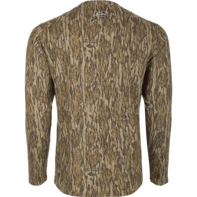 A long sleeved shirt with a tree pattern, designed for optimum comfort and durability. Made of 92% Polyester/8% Spandex with 4-Way Stretch for flexibility. Features Shield 4 Sun™ UPF 50+, Shield 4 Coolant™, Shield 4 Odor™, and Shield 4 Stains™ treatments for protection from the sun, heat, odors, and stains.