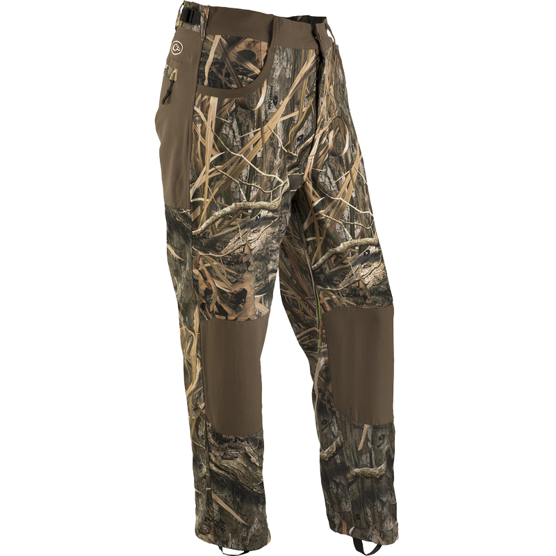 MST Jean Cut Wader Pant: Camouflage pants with adjustable waist and ankle, made of water-resistant Refuge HS™ fabric. Ideal for hunting and fishing.
