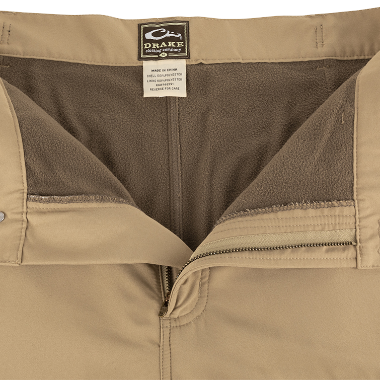 Close-up of the MST Jean Cut Wader Pant - Fleece-Lined, showcasing durable fabric and detailed stitching.