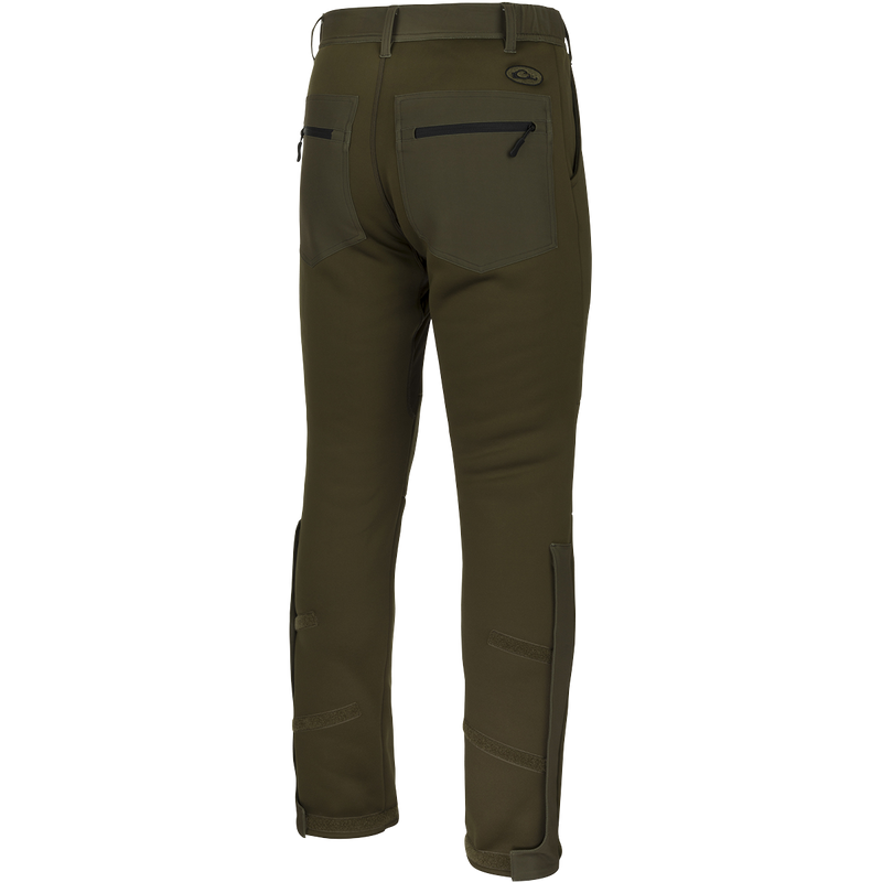 MST Ultimate Wader Pants: A pair of versatile pants that seamlessly transition from casual wear to wader pants. Adjustable ankle fit for comfort under waders or a relaxed look. Side-elastic waist, silicone grip waistband, and zippered rear security pockets.