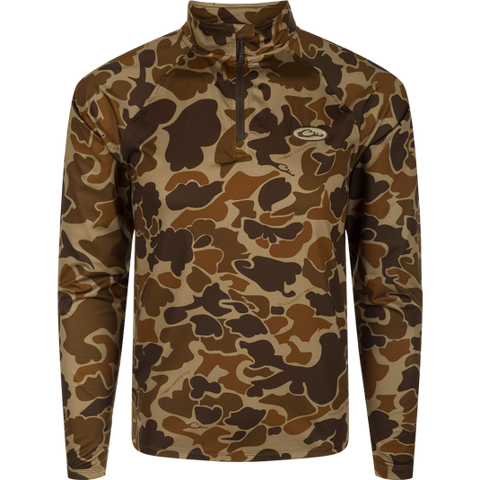 A close-up of the EST Microlite 1/4 Zip Pullover, showcasing its camouflage pattern and raglan sleeves for increased range-of-motion.