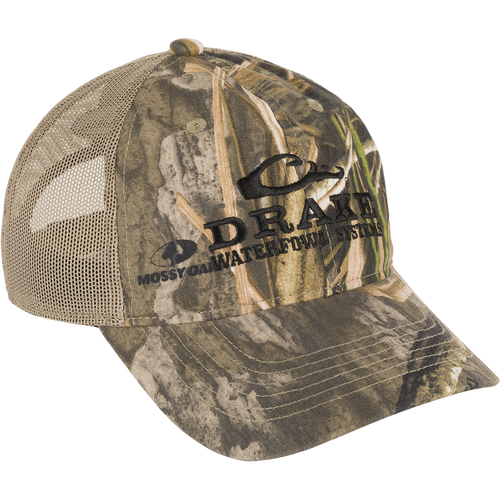 Mesh Back Camo Cap with logo, a lightweight cotton and mesh construction for breathability and comfort. Semi-structured mesh-back panels blend seamlessly with lightly structured front panels. Adjustable fit with hook and loop closure. Drake Waterfowl store.