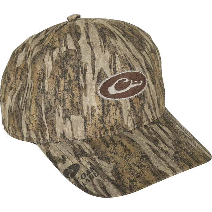 Waterproof Camo Cap with logo, perfect for all-weather hunting. Lightweight, breathable, and 100% waterproof. Conceals from above with camo under the bill.