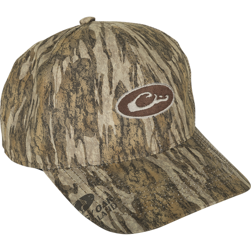 Waterproof Camo Cap with logo, perfect for all-weather hunting. Lightweight, breathable, and 100% waterproof. Conceals from above with camo under the bill.