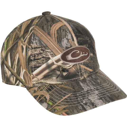 Waterproof Camo Cap with Drake logo, a lightweight, 6-panel hunting hat. Conceals from above, reduces glare with camo under the bill.