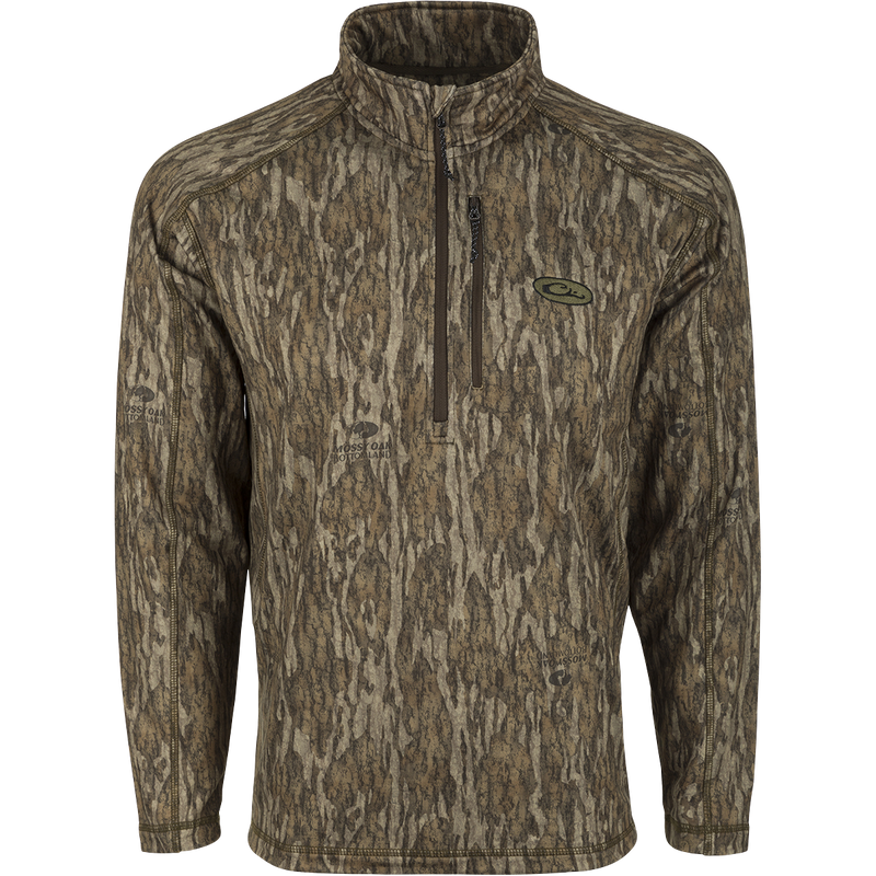 MST Breathelite 1/4 Zip Camo Pullover: A long-sleeved shirt with a tree pattern, crafted with polyester and spandex fleece for ultimate comfort and mobility. Features raglan sleeves, a soft hood, and a vertical zippered pocket for convenient storage.