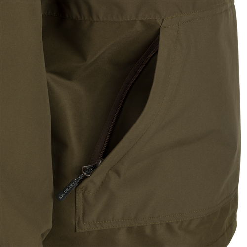 A close-up of the MST Waterproof Fleece-Lined 1/4 Zip Jacket, showcasing its khaki fabric and zipper details.