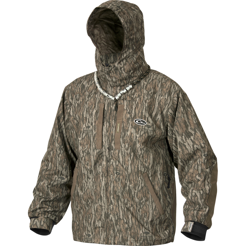 A camouflage jacket with a hood, perfect for early season use. Stay dry without bulk with the EST Heat-Escape Full Zip 2.0. Features include underarm vents, multiple pockets, and adjustable cuffs and waist. Ideal for hunting and outdoor activities.