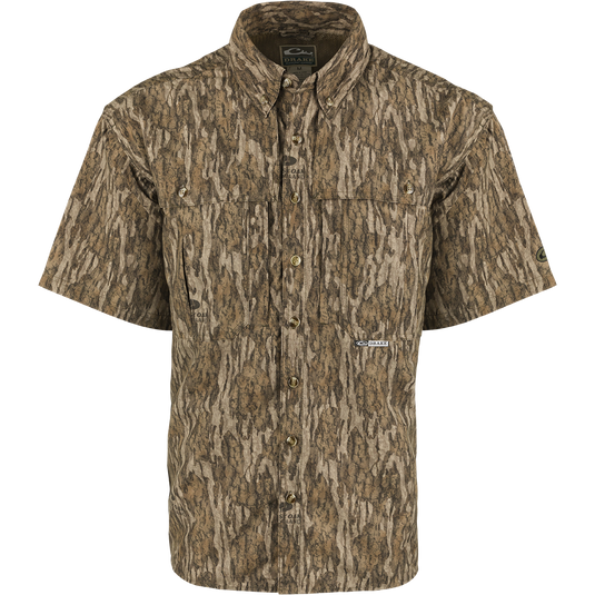 EST Camo Wingshooter's Shirt S/S: Lightweight, breathable shirt for dove hunts, teal and goose hunts, or the shooting range. Vented areas and mesh back for air circulation. Magnattach pocket, heat vents, sun blocker collar, and large chest pockets. Wrinkle-resistant EasyCare fabric.