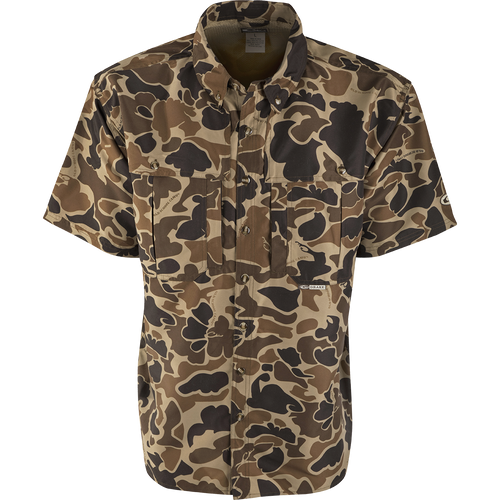 EST Camo Wingshooter's Shirt S/S: Lightweight, breathable shirt for dove hunts, teal and goose hunts, or the shooting range. Vented areas, mesh back, and heat vents provide comfort and air circulation. Magnattach pocket, sun blocker collar, and large chest pockets for convenience.
