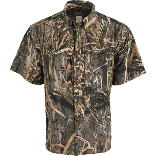 EST Camo Wingshooter's Shirt S/S: A lightweight, breathable shirt for hunting and shooting. Features vents, mesh back, and multiple pockets.