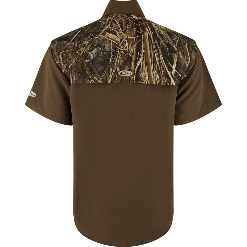 EST Camo Wingshooter's Shirt S/S: A lightweight, breathable shirt designed for dove hunts, teal and goose hunts, or the shooting range. Features vents, breathable mesh, and a comfortable, functional design. Magnattach pocket, heat vents, sun blocker collar, and more.