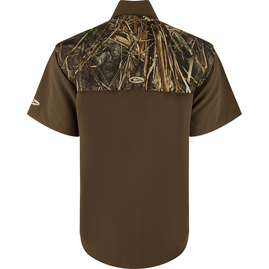 EST Camo Wingshooter's Shirt S/S: A lightweight, breathable shirt designed for dove hunts, teal and goose hunts, or the shooting range. Features vents, breathable mesh, and a comfortable, functional design. Magnattach pocket, heat vents, sun blocker collar, and more.