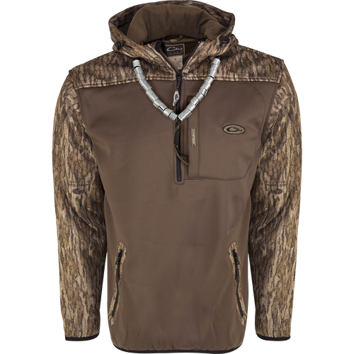 MST Endurance Soft Shell Hoodie: A brown jacket with a silver necklace, featuring a deep quarter-zip neck, Magnattach™ pocket, lower zipped pockets, and mesh-lined sleeves for easy on/off. Fleece-lined hood with drawstring and elastic waist hem.