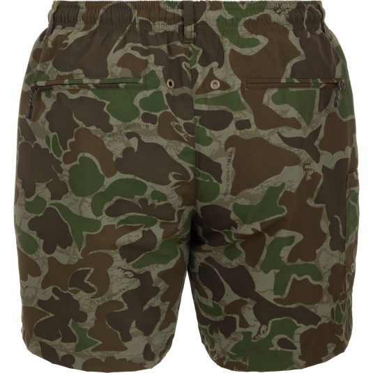 Camo Dock Shorts - Old School Green, a durable pair of nylon shorts with a camouflage pattern, elastic waist, and multiple pockets.