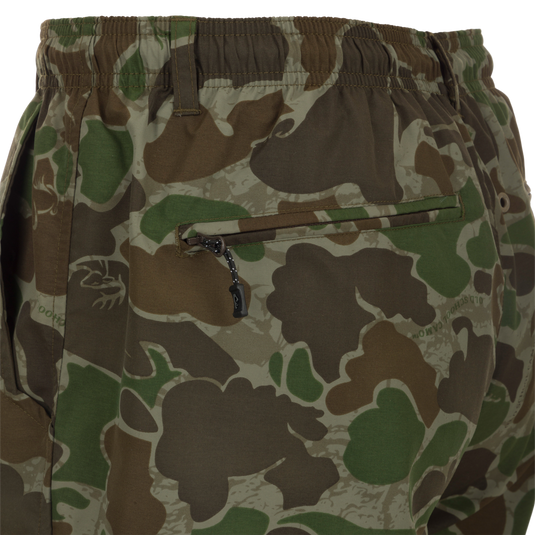 Camo Dock Shorts - Old School Green: Durable nylon fabric with camouflage pattern. Water-resistant, quick-drying. Elastic waist, drawstring, mesh-lined pockets, YKK zippered back pockets, pliers pocket. 6" inseam.