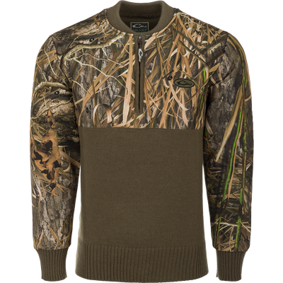 A warm and breathable Camo 1/4 Zip Wool Sweater with a polyester upper treated with DWR for protection against the elements. Perfect for outdoor activities.