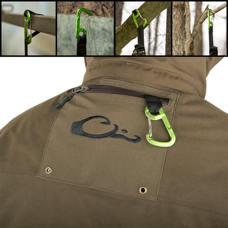 A close-up of the Guardian Elite Flooded Timber Insulated Jacket, featuring waterproof fabric, body-mapped insulation, and various pockets for hunting gear.