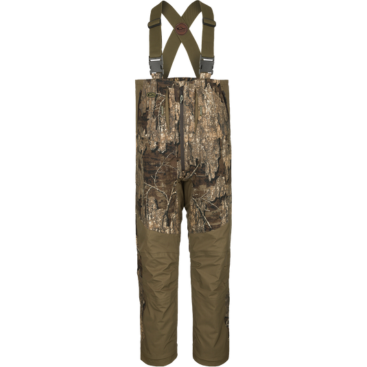 Guardian Flex G3 Flex Bib with BMZ System Liner: Camouflage pants with suspenders and removable insulation panels for adjustable warmth.