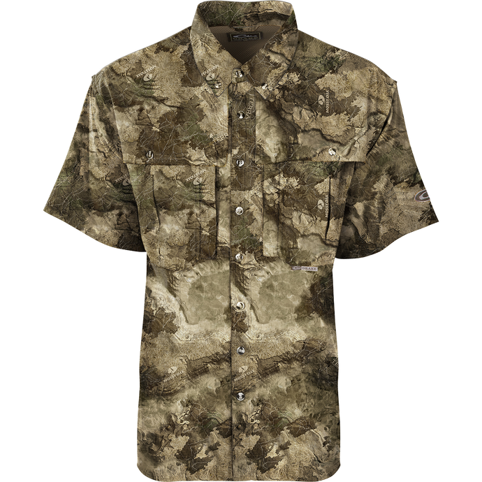 A lightweight, moisture-wicking Camo Flyweight Wingshooter's Shirt for early season hunting. Features include UPF 50+ sun protection, back heat vents, mesh side panels, Magnattach™ chest pocket, and quick-drying fabric. Perfect for dove, goose, or teal season.