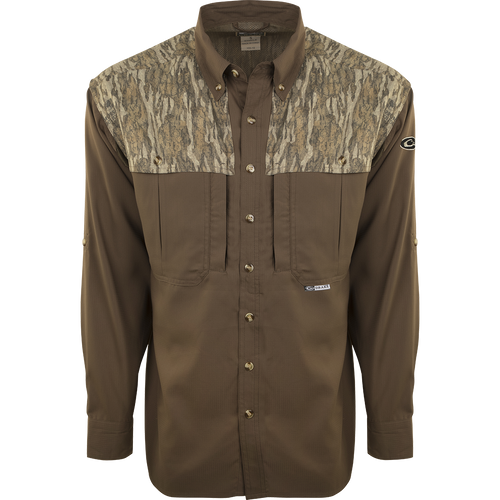 A long sleeved shirt with a camouflage design, perfect for early season hunting. Made of ultra-lightweight polyester fabric with UPF 50+ sun protection. Features include back heat vents, mesh side panels, and multiple chest pockets. The EST Two-Tone Camo Flyweight Wingshooter's Shirt L/S.