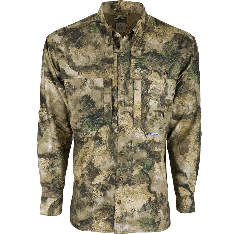 A long sleeved shirt with a camouflage pattern, made of ultra-lightweight polyester fabric. Features include Sol-Shield™ UPF 50+ sun protection, vented mesh back, and multiple chest pockets. Perfect for early season hunting.