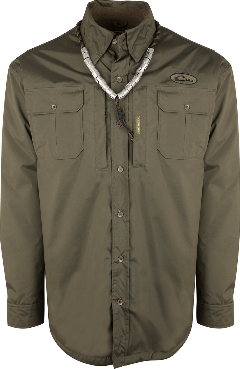 A waterproof Guardian Flex Shirket™ with plenty of pocket storage, ideal for fluctuating weather conditions during hunts.