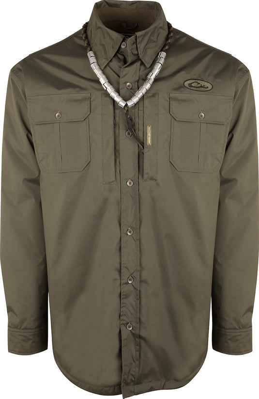A waterproof Guardian Flex Shirket™ with plenty of pocket storage, ideal for fluctuating weather conditions during hunts.
