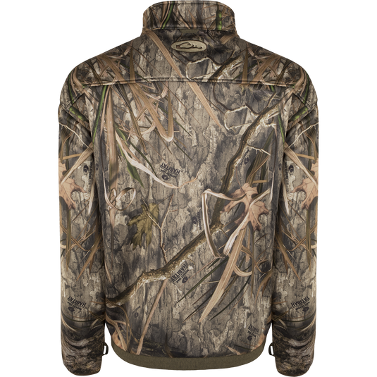 MST Endurance Hybrid Liner Full Zip jacket with camouflage pattern, featuring breathable Endurance fabric for comfort and mobility in warmer conditions. Magnattach™ and zippered pockets, drawstring waist, and elastic cuffs for added convenience.