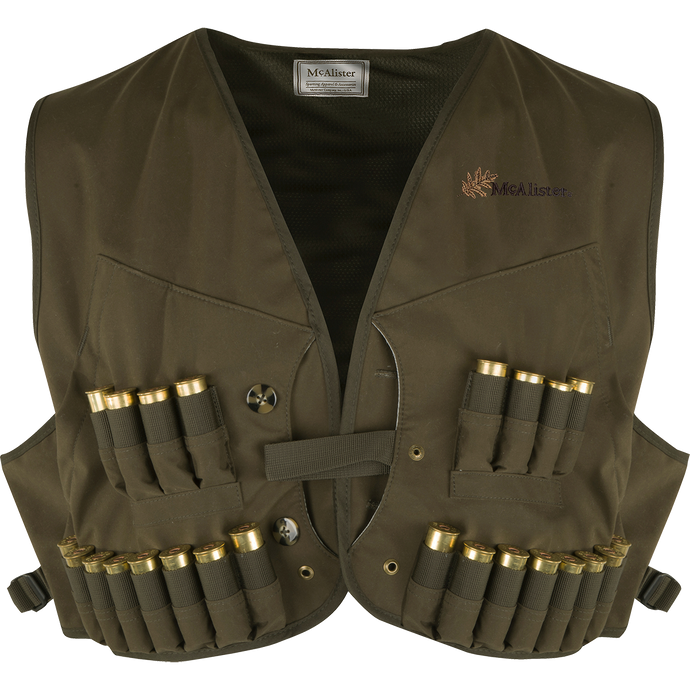 A wax canvas wading vest with shell loops on the front and rear, perfect for waterfowl hunting. Made of durable materials to withstand harsh weather.
