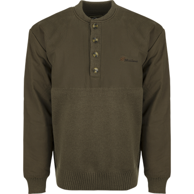 A close-up of the McAlister Waterfowler's Sweater, a green wool pullover with a 4-button quarter placket. Rib-knit cuffs and hem provide a stylish and comfortable fit.