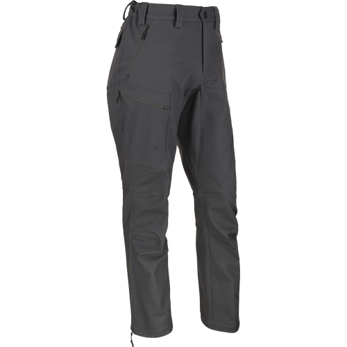 McAlister Microfleece Softshell Waterfowler's Pants: Wind-resistant pants with elastic waist, silicone grip, 4-way stretch, gusseted crotch, side zips, articulated knees, and multiple zippered pockets.