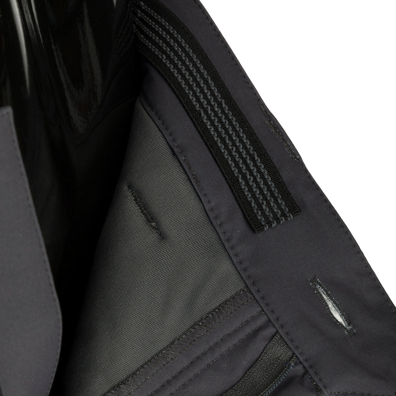 McAlister Microfleece Softshell Waterfowler's Pants: Close-up of a black jacket with 4-way stretch, gusseted crotch, and zippered pockets.