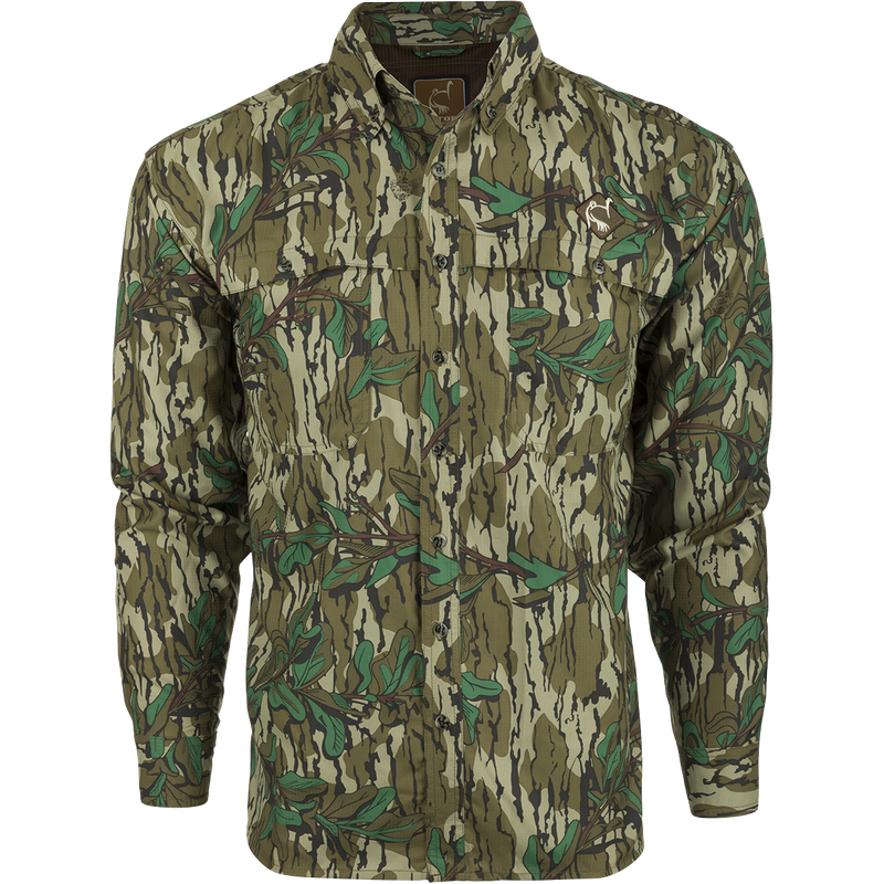 A technical camouflage hunting shirt with a mesh back panel and removable spine pad for increased breathability and comfort. Made of lightweight, quick-drying polyester. Perfect for turkey hunting.