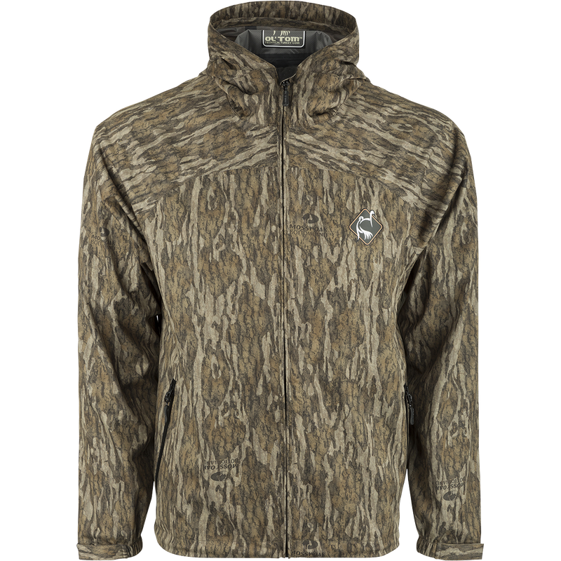 Ultralight Packable Rain Jacket with logo on a sign, close-up of jacket, and close-up of logo. Waterproof, windproof, breathable. Ideal for spring showers during turkey season. Fits easily in your vest. 100% waterproof/windproof fabric. 