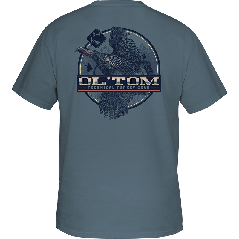 Ol' Tom Camber Flight T-Shirt: Back of a grey shirt with a turkey graphic. Ol' Tom logo on front pocket. Vintage Ol' Tom Series. Cotton/polyester blend. Lightweight.