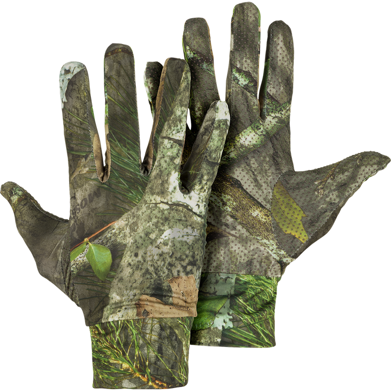 A pair of Stretch Fit Gloves with camouflage pattern, offering concealment and function for all-season outdoor activities. Stretch lycra provides maximum dexterity, while the rubberized grip palm ensures a secure hold on your gun.
