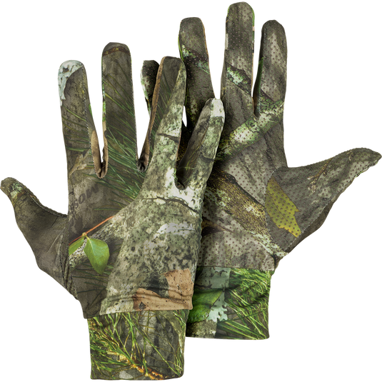A pair of Stretch Fit Gloves with camouflage pattern, offering concealment and function for all-season outdoor activities. Stretch lycra provides maximum dexterity, while the rubberized grip palm ensures a secure hold on your gun.