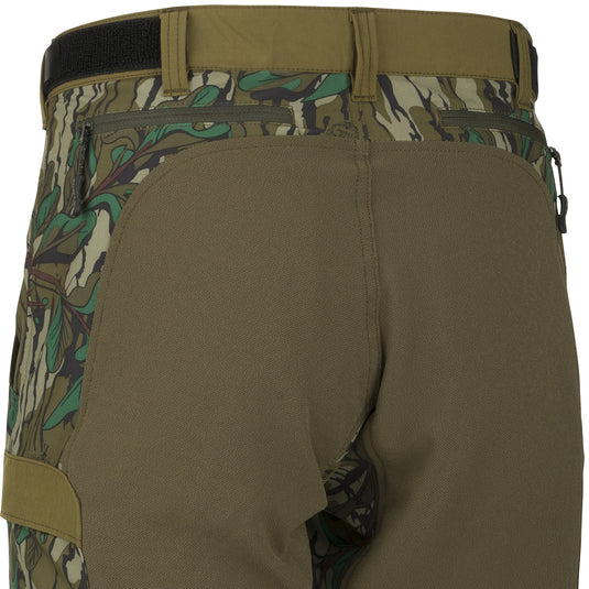A close-up of the Youth Tech Stretch Turkey Pant, a lightweight, moisture-wicking 4-way stretch pant with reinforced knees and gusseted crotch for comfort. Ideal for hunting and outdoor activities.