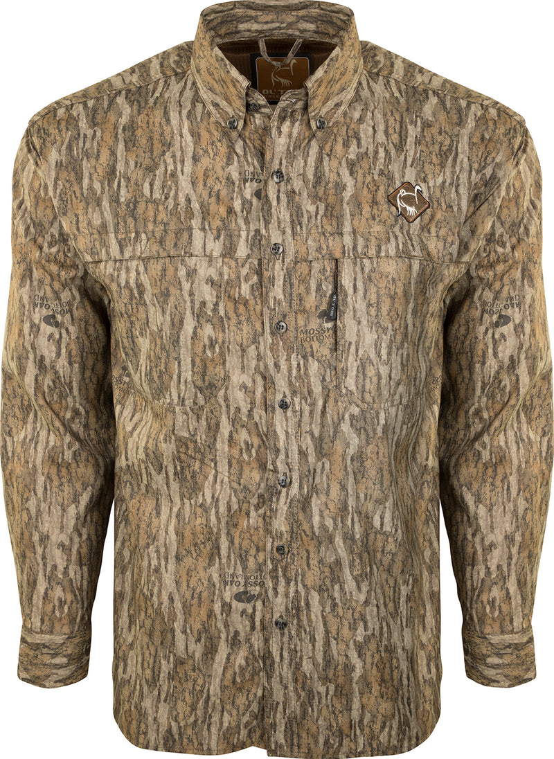 A lightweight, breathable turkey hunting shirt with a camouflage pattern, mesh back, and side panels. Features UPF 50+ sun protection, convenient pockets, and a removable spine pad. Perfect for warm-weather pursuits.