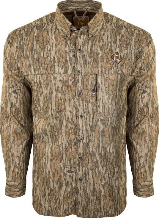 A lightweight, breathable turkey hunting shirt with a camouflage pattern, mesh back, and side panels. Features UPF 50+ sun protection, convenient pockets, and a removable spine pad. Perfect for warm-weather pursuits.