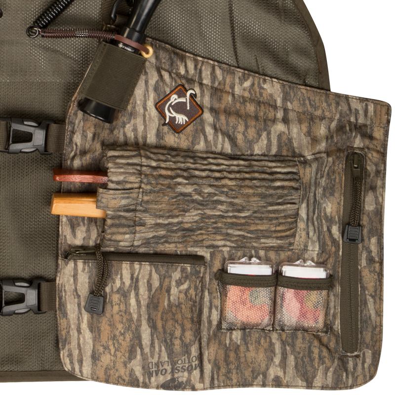 Time & Motion™ Easy-Rider Turkey Vest: Camouflage vest with scope and stick. Lightweight and functional. T-Beam back pad for comfort. Magnattach padded rear seat cushion. Adjustable straps for all sizes. External call pouch, striker sleeves, and more. 2 lbs. 10 oz.