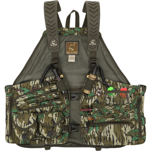 Time & Motion™ Gunslinger Turkey Vest - A camouflage vest with a well-organized design. Features multiple call pockets, detachable locator call cords, and storage compartments for gear. Comfortable and intuitive for easy access. Ideal for hunting and fishing.