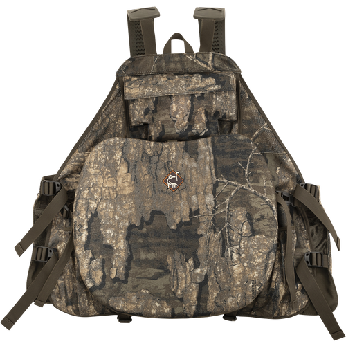 Time & Motion™ Gunslinger Turkey Vest: A camouflage backpack with a logo, straps, and multiple pockets for calls and gear. Lightweight and well-organized for easy access.