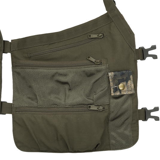 Time & Motion™ Gunslinger Turkey Vest - A khaki bag with a pocket, designed for intuitive access to calls and gear while distributing weight efficiently.